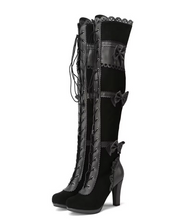 Black high-heeled Lolita boots with lace-up front and decorative trim