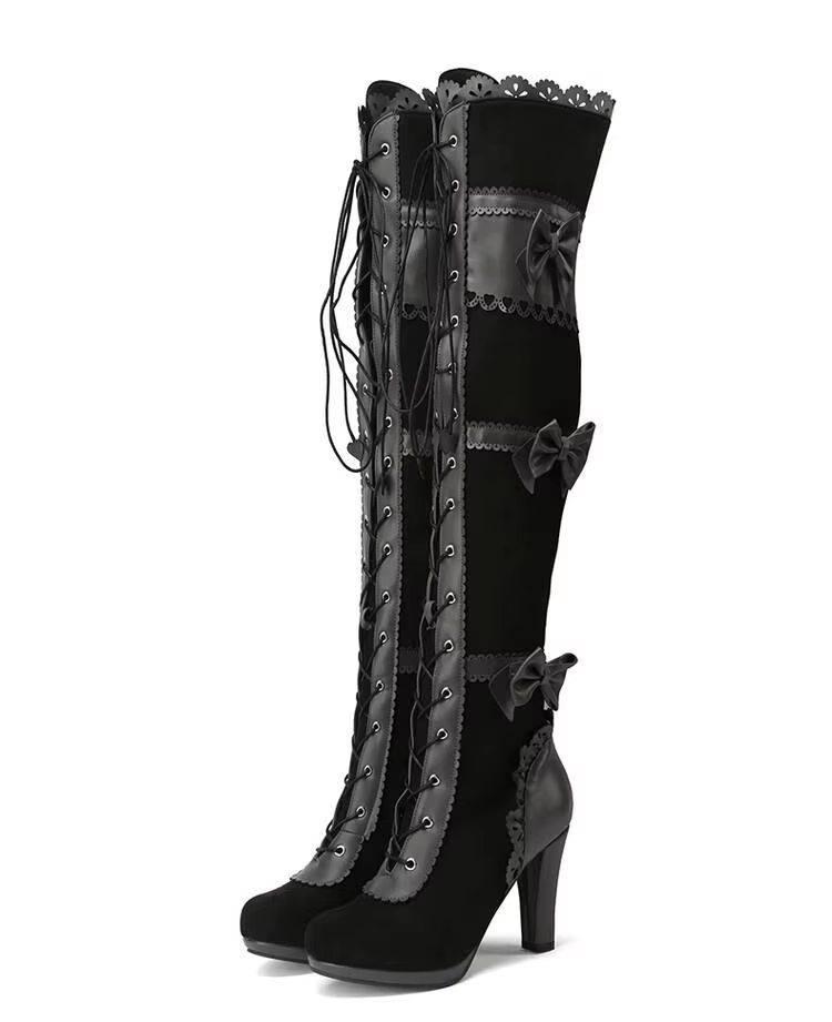 Black high-heeled Lolita boots with lace-up front and decorative trim