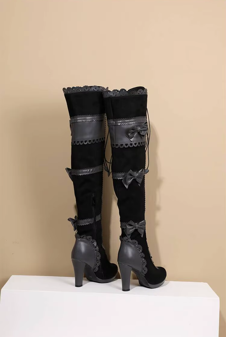 Black gothic Lolita boots with bows and lace trim, over-the-knee style