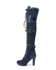 Over-the-knee navy blue Lolita boots with lace trim and bows, side view