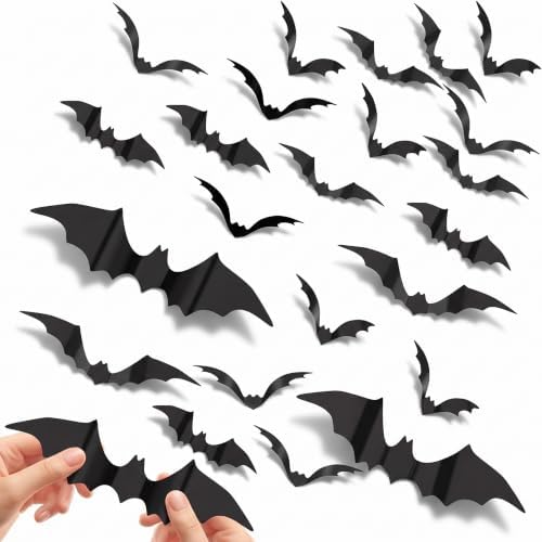 112-piece set of oversized 3D black Halloween bat decorations creating a flying wall display