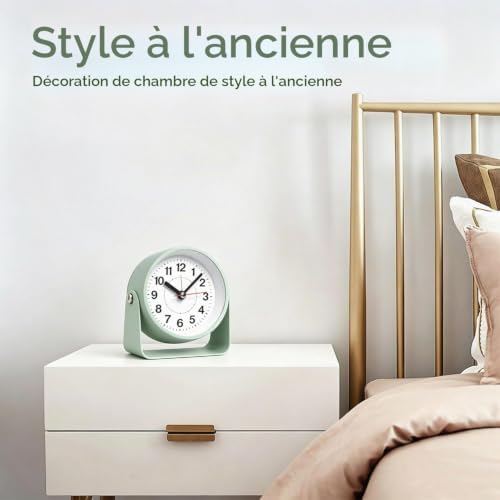3.5 inch silent analog alarm clock with night light displayed on a bedside table