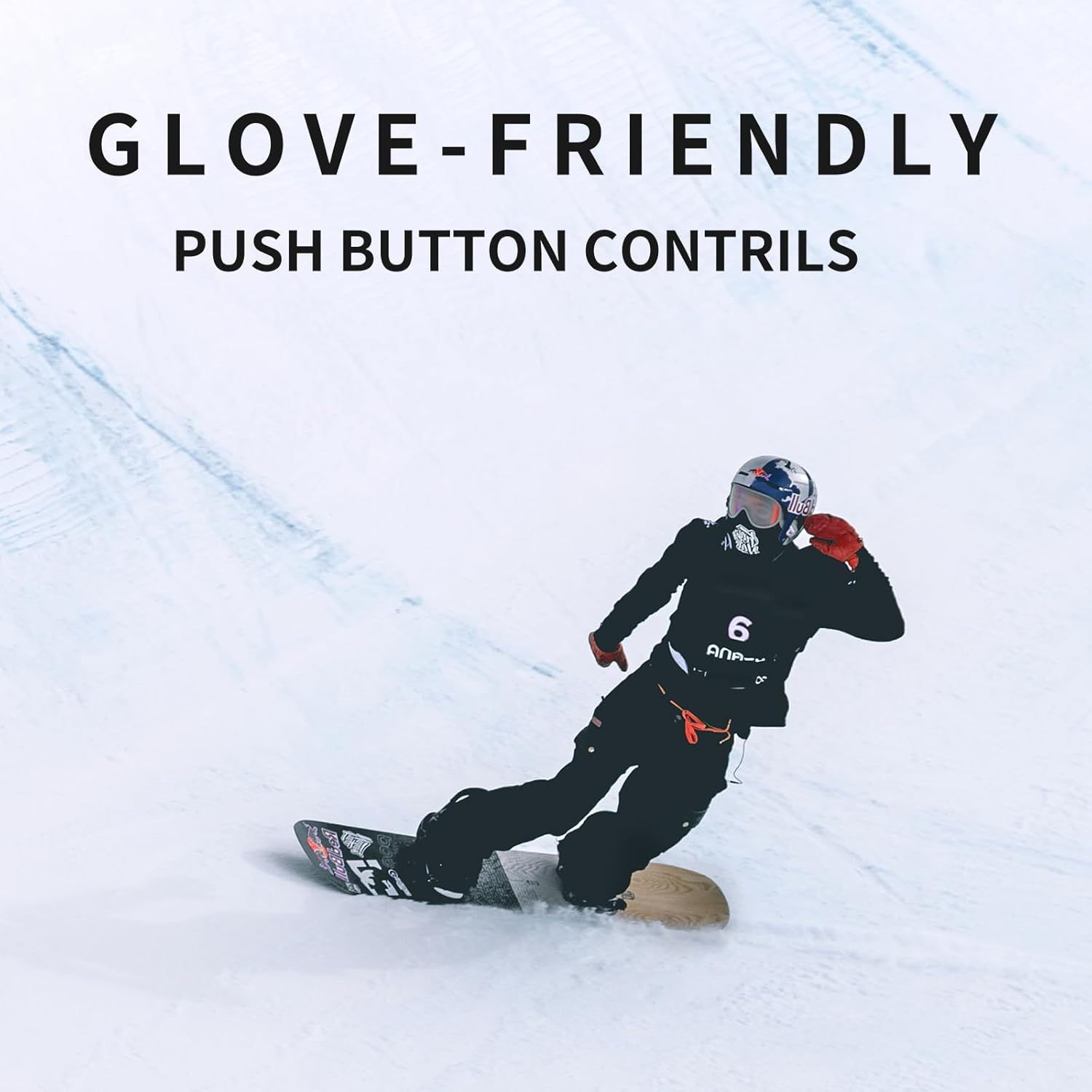 Snowboarder using Origem helmet speakers with glove-friendly push controls
