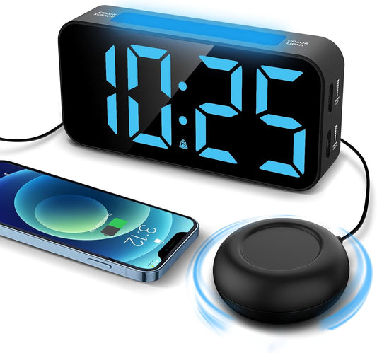 Front view of Topski alarm clock showing large LED display with bed shaker and USB port.