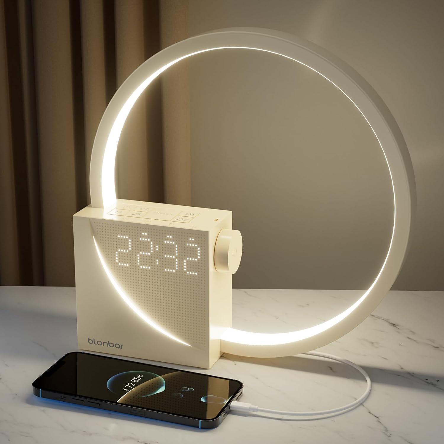 Blonbar sunrise alarm clock with USB port and circular light, displayed on a bedside table.