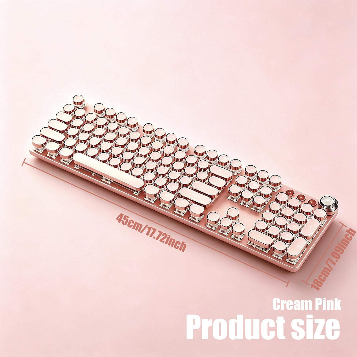 Cream pink full-size typewriter keyboard measuring approximately 45 by 18 cm