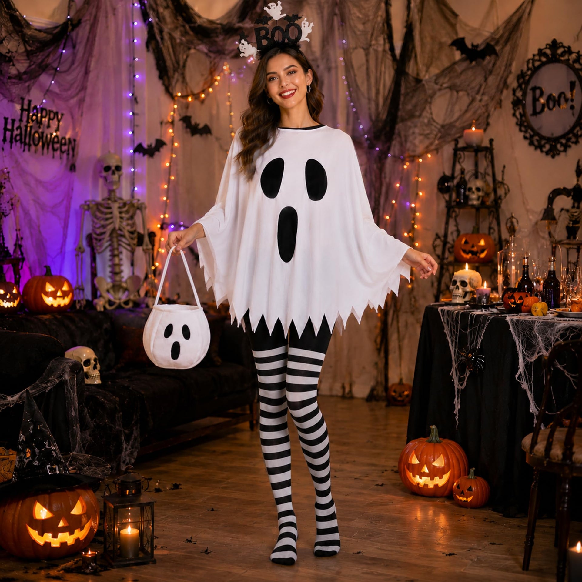 Woman wearing white ghost Halloween costume with striped tights and ghost candy bag at Halloween party
