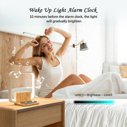 Happy woman stretching in bed next to a sunrise wake-up alarm clock with natural light and sounds.