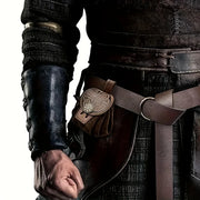 Medieval belt pouch worn at the waist with a dark costume
