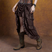 Brown ruffled pirate skirt styled with boots, side view