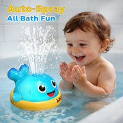 Automatic whale sprinkler toy spraying water during bath time