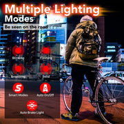 Cyclist in the city with multiple red rear light modes including blinking and smart auto-on.