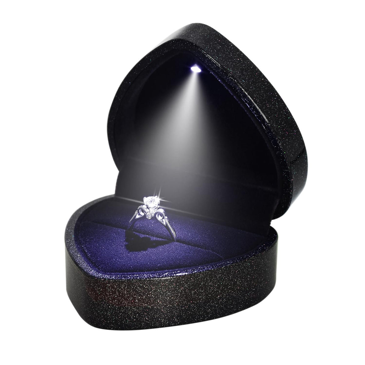 Black glitter heart-shaped LED ring box open with spotlight on ring