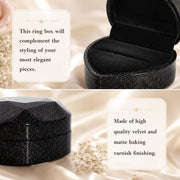 Black velvet interior and sparkling exterior of heart ring gift box