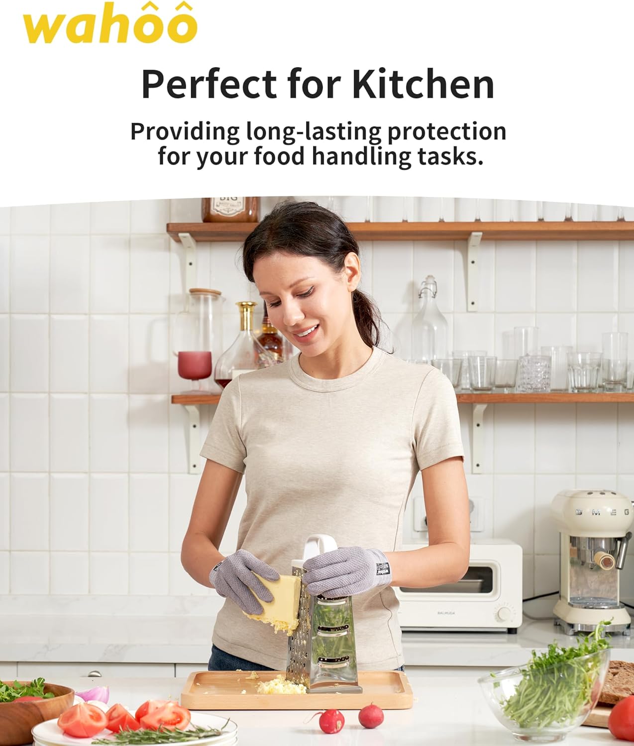 Woman grating cheese while wearing comfortable cut-resistant gloves in the kitchen.