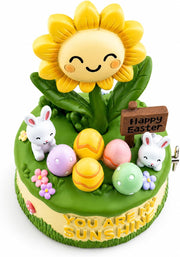 Top view showing Easter eggs, bunnies and sunflower music box