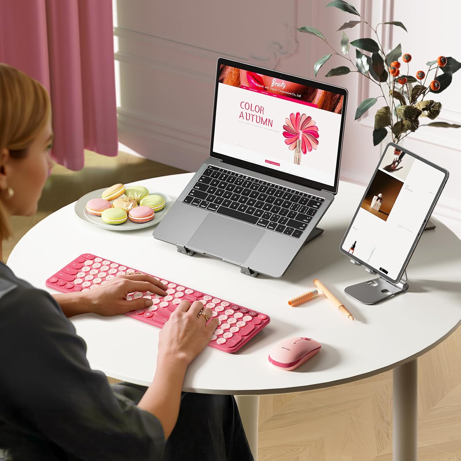 Elegant workspace with Seenda pink wireless keyboard and mouse in use