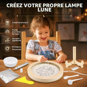 Child creating a textured DIY moon lamp during a fun arts and crafts activity