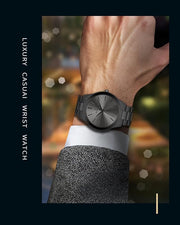 Promotional display of luxury men's black wristwatch in elegant setting