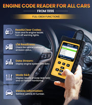 Hand using OBD2 scanner inside vehicle to read engine codes and system data