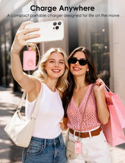 Compact pink keychain power bank with built-in charging cables on the go