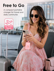 Pink mini portable charger with keyring during air travel