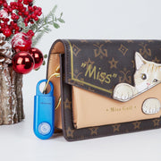 Personal safety alarm attached to a handbag for everyday carry
