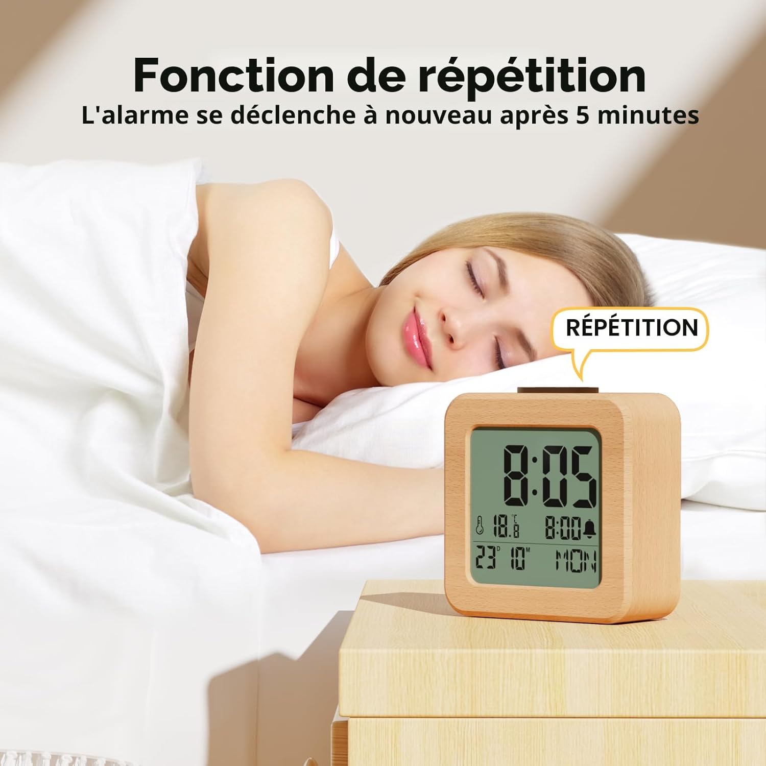 Wooden alarm clock with snooze function next to sleeping person