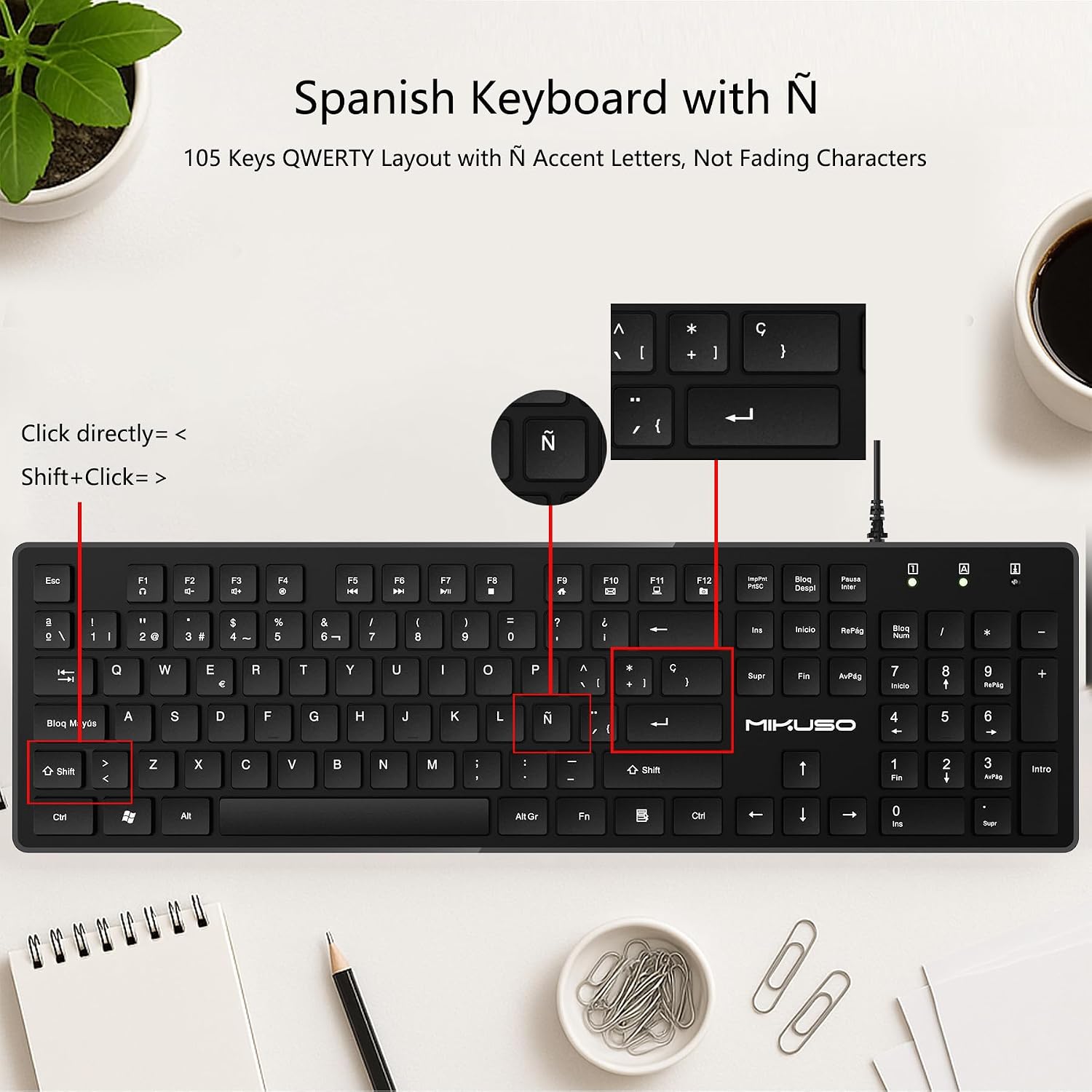 A black wired keyboard with Spanish N key styling, shown on a white desk with text explaining the QWERTY layout with ¡tilde accent letters. The image includes callout boxes and arrows pointing to key areas, plus decorative props like a plant, coffee cup, notebook, pencil, and paper clips.