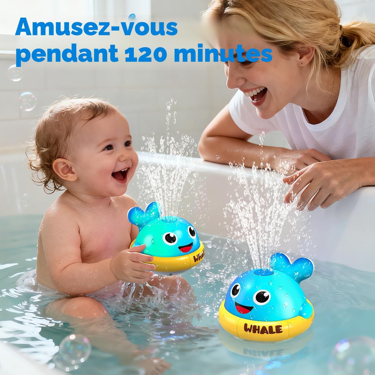 Toddler enjoying 120 minutes of whale sprinkler bath toy fun
