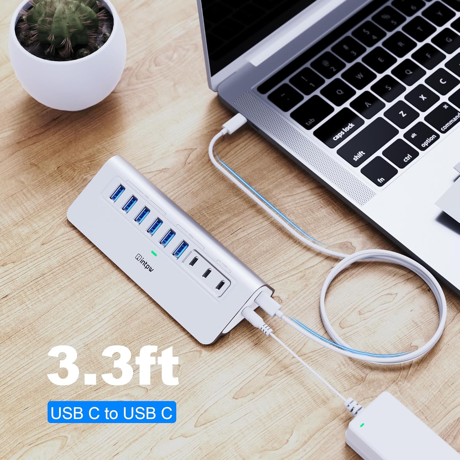 Hub connected to laptop with 3.3ft USB-C to USB-C cable on desk