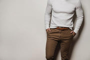 Men's tan Vince Camuto leather belt styled with khaki pants