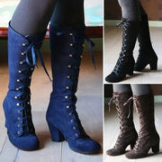 Color options of vintage knee-high boots in navy, black, and brown