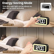 Voice activated digital alarm clock demonstrating energy saving display activation