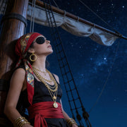 Pirate-inspired red scarf and gold-tone costume accessories